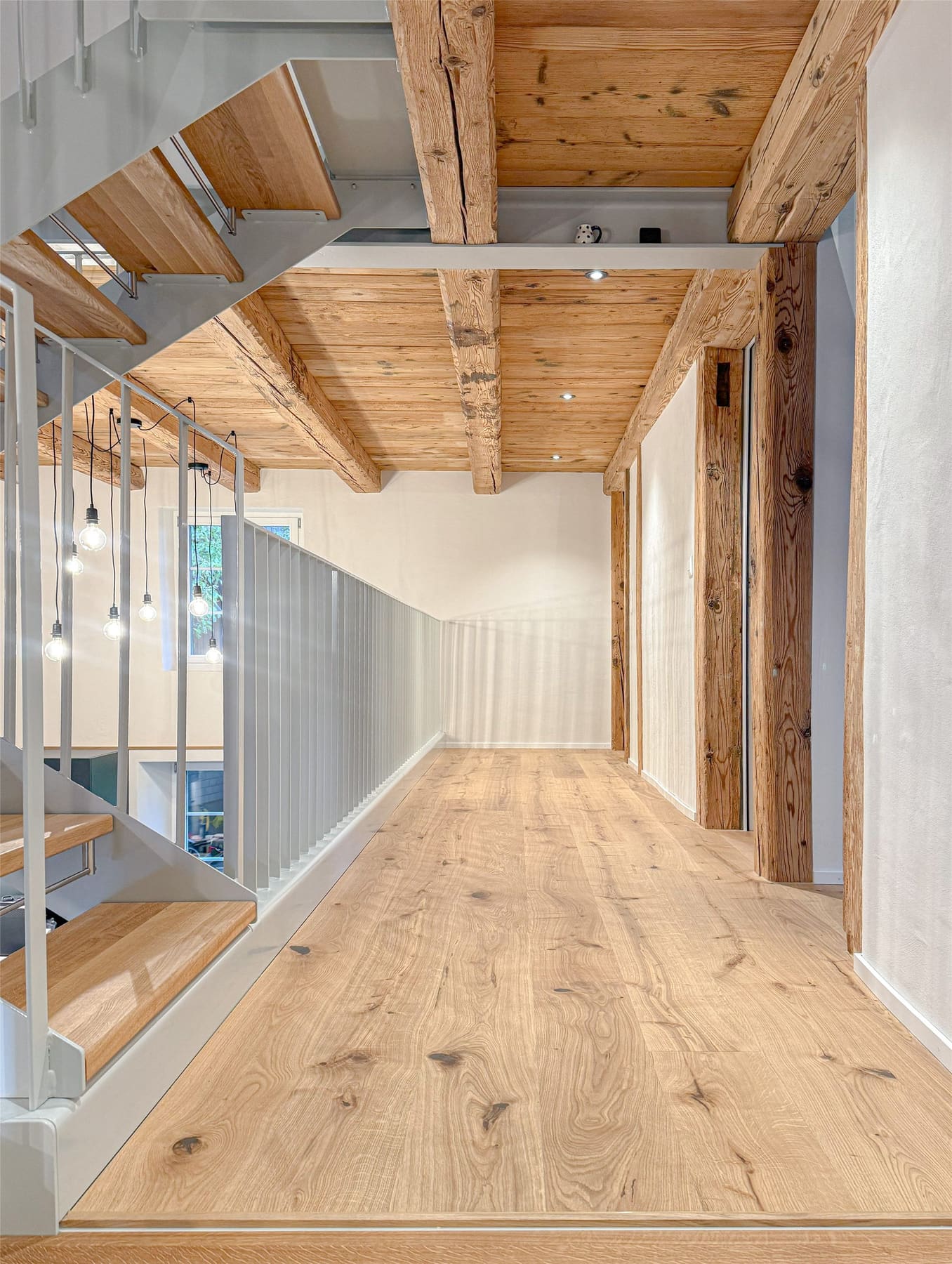 Interior with timber surfaces and built-in elements
